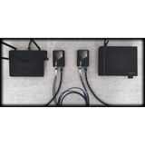 Undentia AB EtherWAN media converter setup with fiber optic cables connecting a network router and streaming device