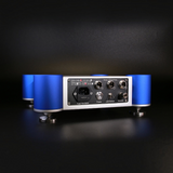 Undentia AB Ediscreation Firebird LPS linear power supply rear panel with blue cylindrical feet on a black background