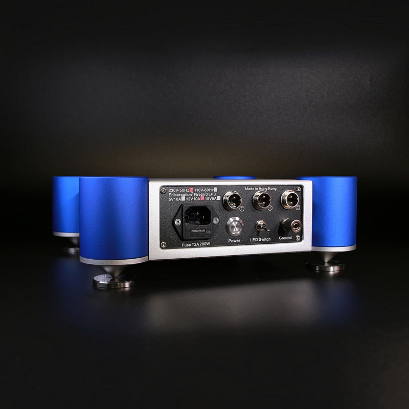 Undentia AB Ediscreation Firebird LPS linear power supply rear panel with blue cylindrical feet on a black background