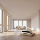 Undentia AB Matrix Audio ND-1 DAC in a minimalist living room on a wooden platform, featuring a sleek silver chassis.