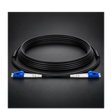 Undentia AB armored single mode duplex fiber optic cable with blue connectors coiled on a dark background