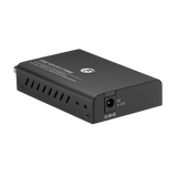 Undentia AB black Gigabit fiber optic media converter with ST connector port and DC power input for audio networks.