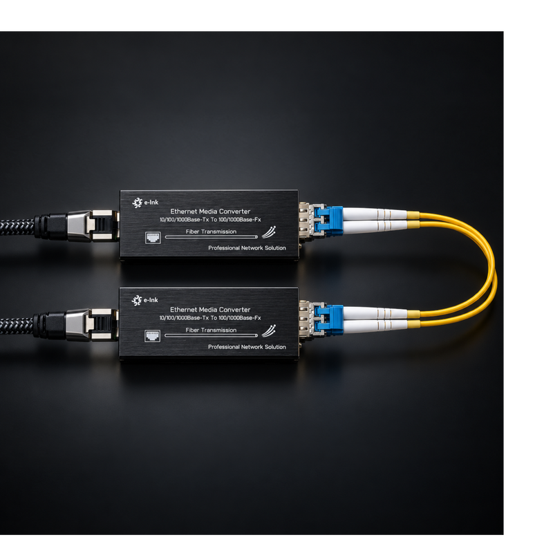 Undentia AB micro media converters with yellow fiber optic cables connected against a black background