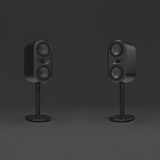 Undentia AB AKu Onar active studio monitors in black with dual TeXtreme drivers on matching stands against a dark background