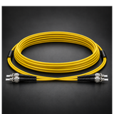 Undentia AB armored yellow single mode duplex fiber optic cable with industrial ST metal connectors on black background