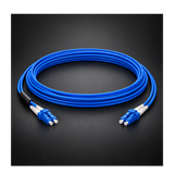 Undentia AB blue armored single mode duplex fiber optic cable with LC connectors on a dark background