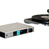 Undentia AB Element X2 Pure music streamer and DAC in silver with a vinyl turntable in the background