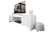Undentia AB F Two white active subwoofer next to a modern white TV stand with speakers and a television.
